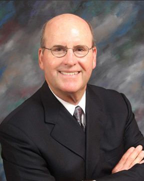 Photo of attorney William Johnson smiling